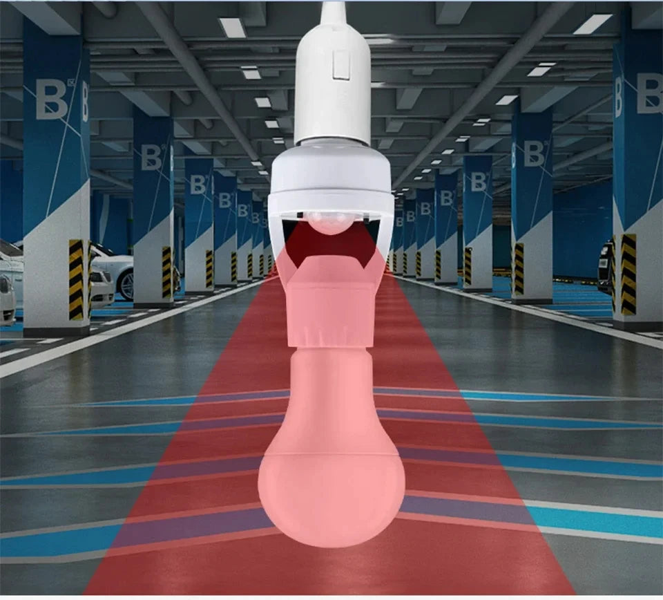 Automated guided vehicle (AGV) in a warehouse setting with 'B' branding on pillars.