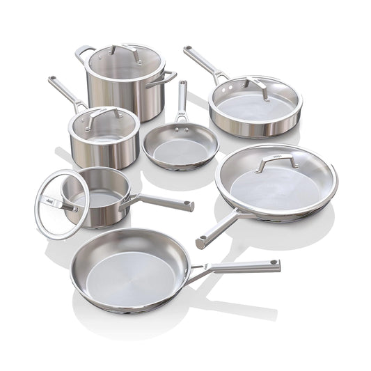 Set of stainless steel cookware with lids on a white background
